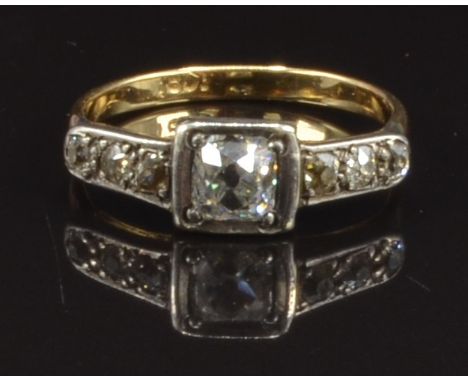 Victorian 18ct gold ring set with an old cut diamond of approximately 0.4ct and with further diamonds to the shoulders, size 
