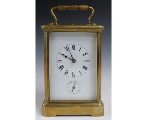 19thC or early 20thC brass cased repeating carriage clock, the white enamel dial with Roman numerals and alarm dial below, th