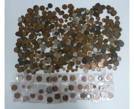 An amateur collection of UK and overseas coinage, 18thC token, George III etc, in a vintage Huntley &amp; Palmer tin