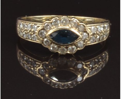 A 9ct gold ring set with a marquise cut sapphire and diamonds, size P, 2.2g