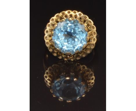 A 9ct gold ring set with a round cut blue topaz, size N, 6.7g