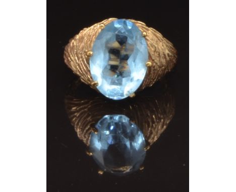 A 9ct gold ring set with a faux aquamarine, 5.8g, size N