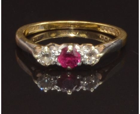 A 9ct gold ring set with a round cut ruby and two round cut diamonds, size L, 2.2g