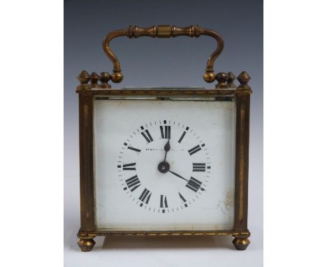 Brass carriage clock in 'squat' brass case, Mappin and Webb to enamel Roman dial, the movement with Leo stamp, approximately 