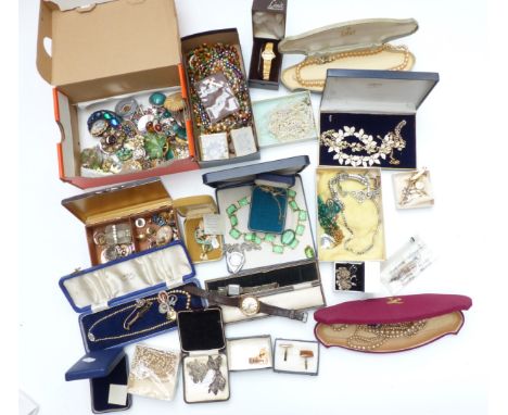 A collection of costume jewellery including beads, silver and marcasite brooches, filigree earrings, diamanté necklaces, silv