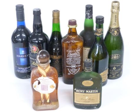 Nine bottles of mixed wine and spirits including three of brandy, Remy Martin, Camus Napoleon Cognac and Le Cuvier Napoleon B