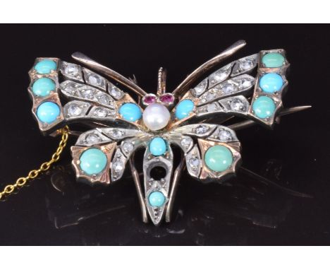 Victorian brooch in the form of a dragonfly/ butterfly set with rose cut diamonds, turquoise cabochons and pearl and ruby eye