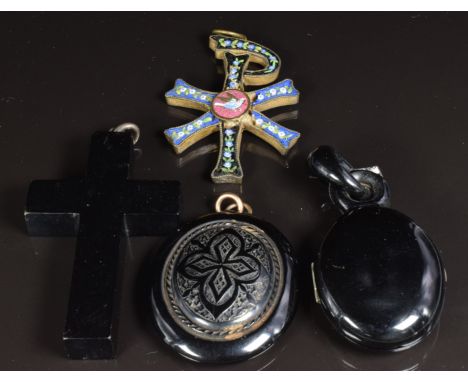 Victorian jet locket opening to reveal a portrait and plaited hair, a Victorian jet pendant, a cross and a micro mosaic penda
