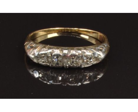 Victorian ring set with five diamonds in a scrolling setting, size L, 2.5g