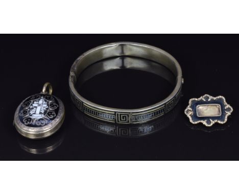 Victorian bangle set with black enamel and a Victorian mourning locket set with black and white enamel&nbsp;