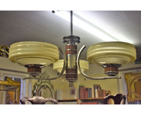 A vintage chrome three branch ceiling light,&nbsp;76.5cm high.&nbsp; 