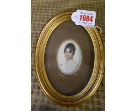 English School, early 19th century, head and shoulders portrait miniature of a young lady, with finely painted face, probably