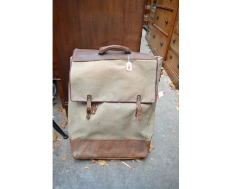 A vintage French folding artist's easel, initialled SDGD, in canvas bag; together with a folding stool. 