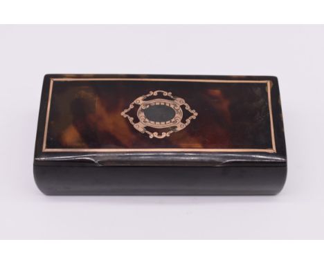 A 19th century tortoiseshell and gold pique snuff box, 9.5cm wide.&nbsp; 