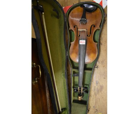 An antique Continental violin,&nbsp;labelled 'Joseph Guarnerius,...1660', with 14in two piece back, with bow and case. 