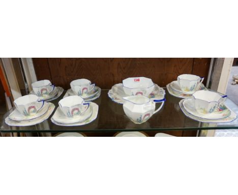 A Shelley 'Archway of Roses' pattern part tea service, in the Queen Anne shape, comprising: sandwich plate; cream jug; sugar 