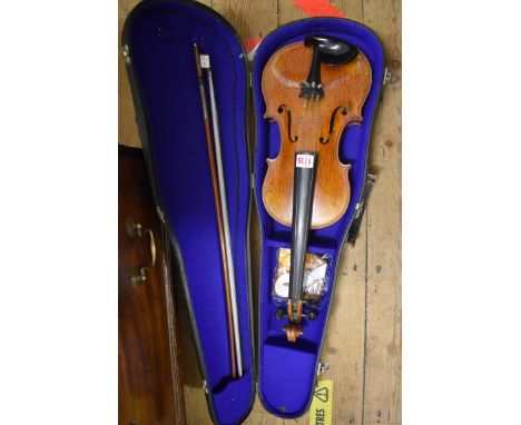 An antique Continental violin,&nbsp;with 14in two piece back, with bow and case. 