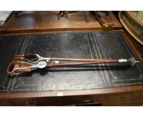 Two vintage shooting sticks. 