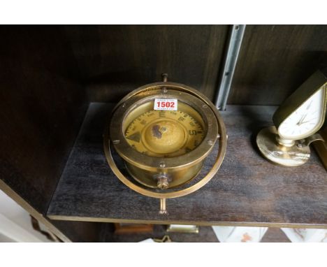 A brass ship's gimbal compass,&nbsp;19.5cm wide. 