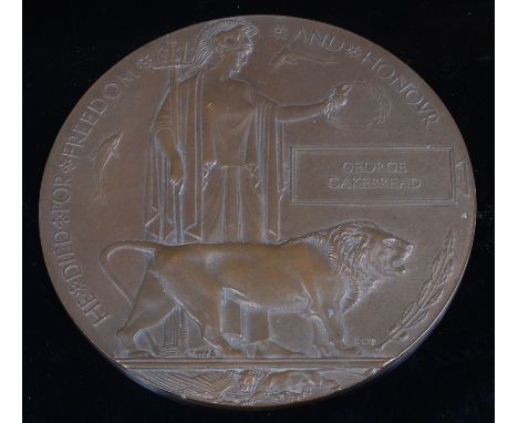 A WW I bronze memorial plaque, naming George Cakebread.