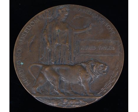 A WW I bronze memorial plaque, naming Alfred Taylor.