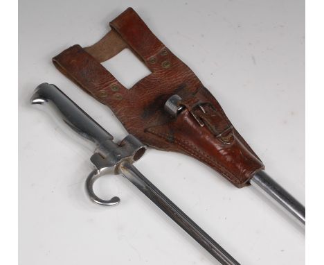 A French 1886 model Lebel bayonet, having a 52cm cruciform blade, hooked quillon stamped 56754 and steel handle, in a steel s