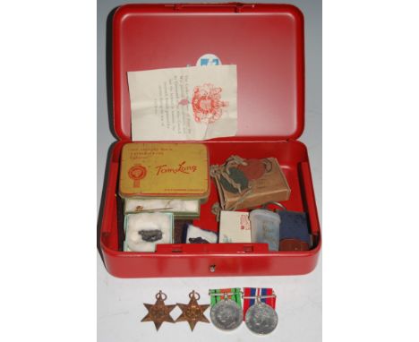 A WW II medal group to include 1939-45 Star, Africa Star, War and Defence to 7684559 A.E. CARNELL, in original box, together 