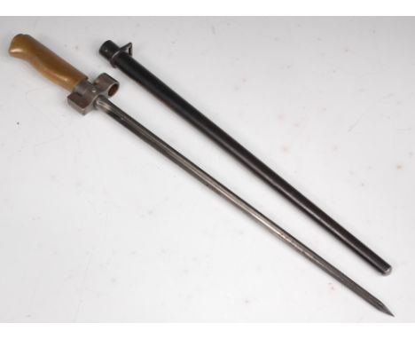 A French model 1886/93/16 Lebel bayonet, having a 34cm cruciform blade, the nickel muzzle ring stamped 27743 with brass handl
