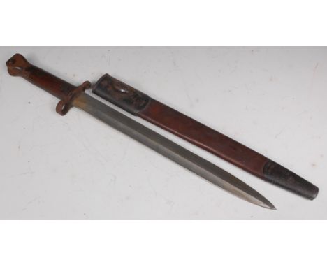 A British 1888 pattern Mk I 2nd type bayonet, having a 30cm unmarked double edged blade and two piece wooden grip, in a steel