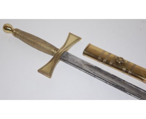 A Masonic ceremonial sword, the 82cm etched steel blade marked Spencer & Co, Gt Queen St, London WC, having a brass hilt and 