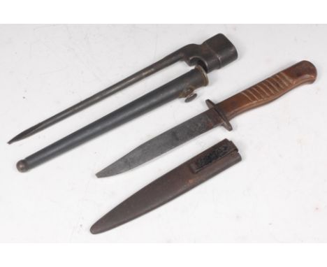 A WW II British No.4 Mk II spike bayonet in scabbard, 26cm, together with a WW II German? fighting knife (tip missing) in ste