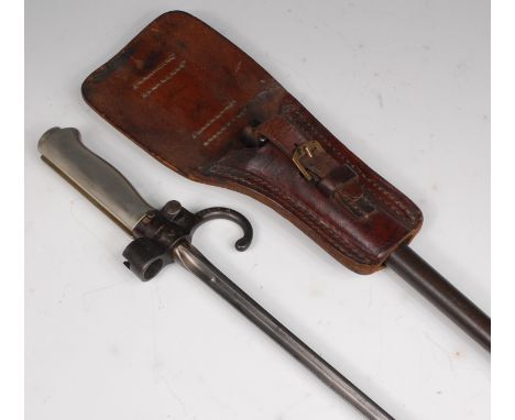 A French model 1886 Lebel bayonet, having a 52cm cruciform blade, hooked quillon stamped 40800 and nickel handle, in a steel 