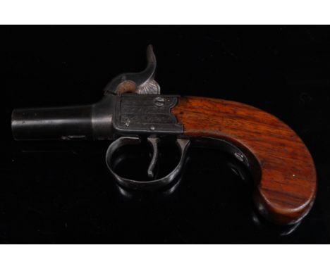 A 19th century percussion box lock pocket pistol, having a 3.8cm turn-off steel barrel, with engraved lock plates signed Wils