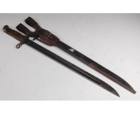 A Japanese 1897 pattern Arisaka bayonet, having a 40cm single edged fullered blade with triple circle stamp, hooked quillon a