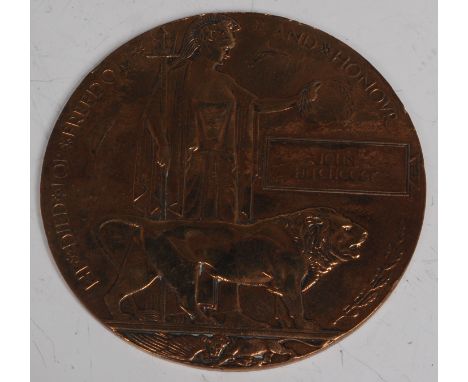 A WW I bronze memorial plaque, naming John Hitchcock.