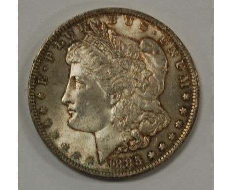 USA 1885 silver Morgan dollar, obv. Liberty head above date, rev. spread eagle with arrows within wreath and legend, New Orle