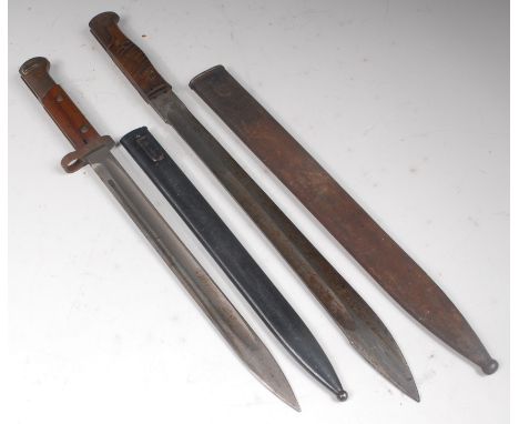 A WW I German butcher bayonet, the 37cm blade stamped Simson & Co SUHL and further stamped with a crown above W 15 to the bac
