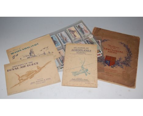A collection of assorted military cigarette cards and cigarette card silks to include Players Aircraft of the R.A.F. and Gall