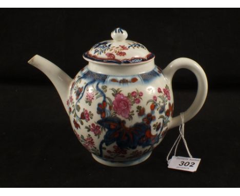 A Lowestoft polychrome floral teapot, unassociated cover (body crack), height 5 1/2"