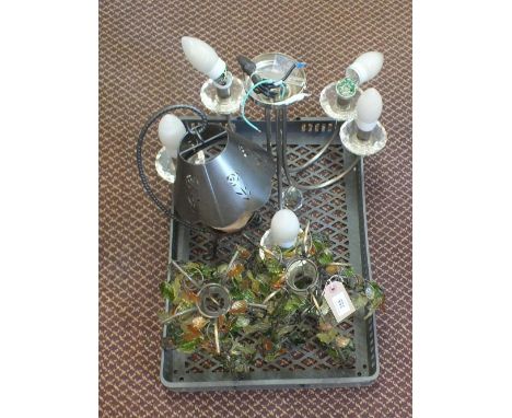 A pair of metal and glass ceiling lights, a light fitting and a candle lamp
