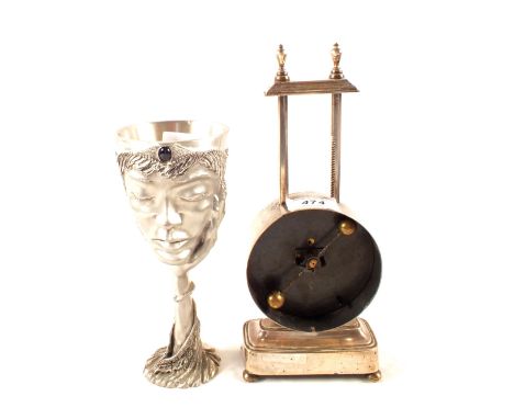 A Gravity clock (as found) and a Selangor Lord of the Rings goblet
