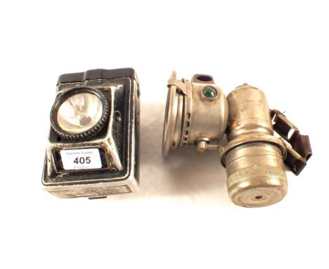 A Lucas carbide lamp plus a battery Policemans lamp