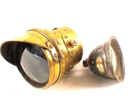 A vintage Brass motorcycle lamp glass marked F.R.S. and a Nytelyte cycle lamp