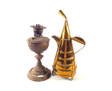A Brass oil lamp plus an unusual Brass water can