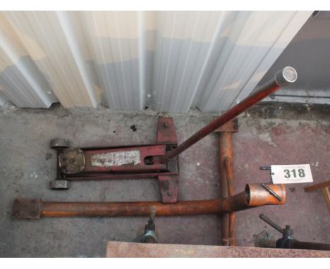 An engine stand with a trolley jack