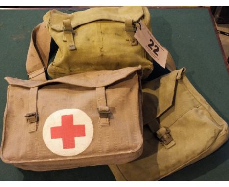 Two post war First Aid bags, an Officer's valise (dated 1940) and a small pack