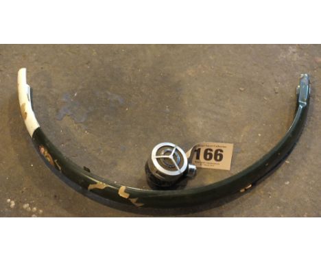 A microphone with an Army rear cycle mudguard