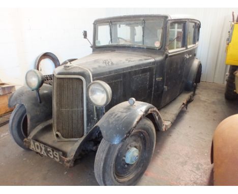 An Armstrong Siddeley coach built petrol saloon in black/blue.  This true classic has a two-axle rigid body with registration