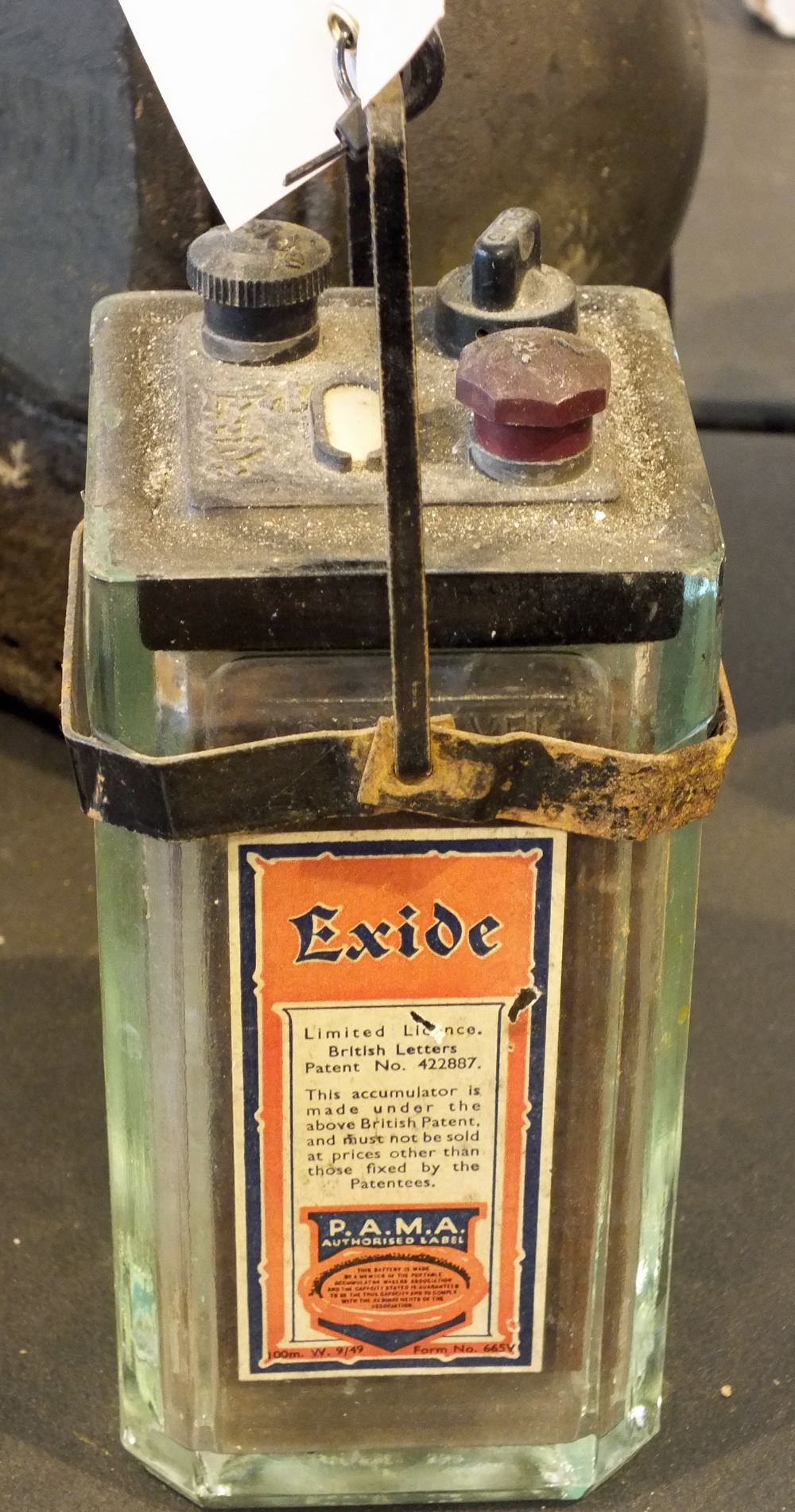 A vintage exide glass battery