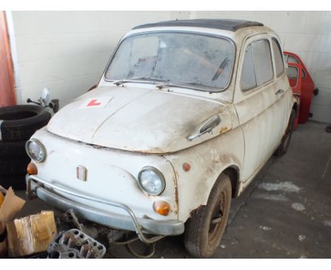A Fiat 500, this is a restoration project and the now iconic vehicle comes with an extensive collection of spare parts includ